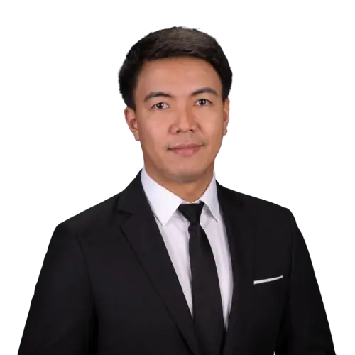Jayvee Osapdin in a black suit and tie