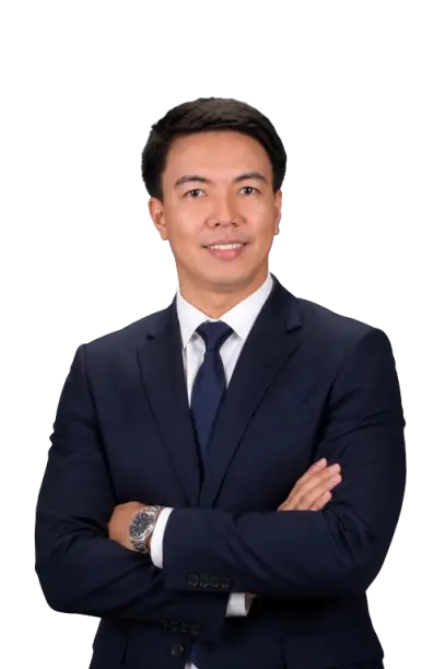 Jayvee Osapdin in a navy suit, arms crossed